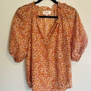 Xirena top in a beautiful orange pink and white print. Size small. Like new
